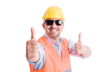 Happy contractor or builder showing thumbsup
