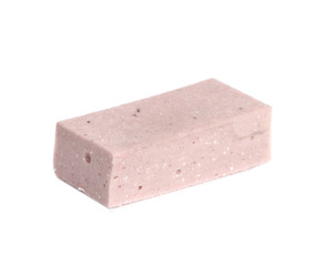 Single strawberry pastille with marmalade on white background