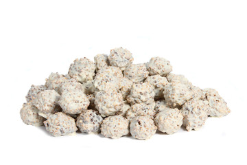 White truffles hand made by chocolatier on white background