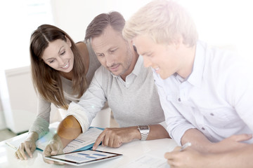 Marketing people working on business plan