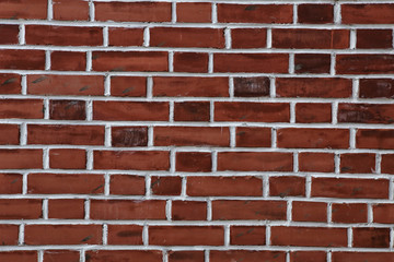Fototapeta premium Red brick wall background - texture pattern
