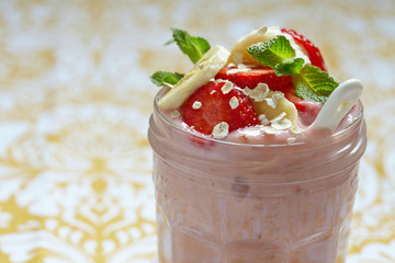 Overnight oatmeal smoothie with strawberry and banana