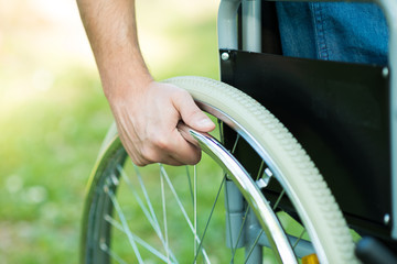 Detail of a man using a wheelchair