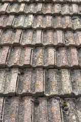 Old roof with ceramic tiles closeup