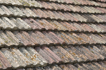 Old roof with ceramic tiles closeup