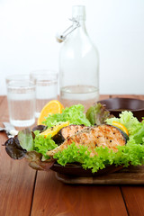 Grilled salmon with orange sauce