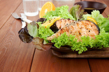 Grilled salmon with orange sauce