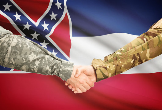 Military handshake and US state flag - Mississippi