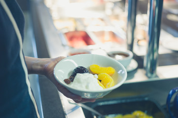 Woman at breakfast buffet