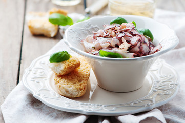 Octopus carpaccio in the table