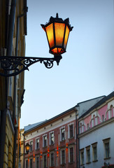 Fototapeta na wymiar Old street lamp on the wall