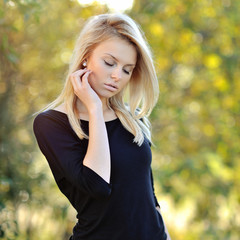 Portrait of beautiful young woman outdoor