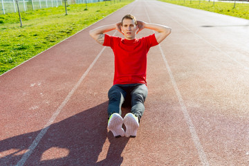 Fototapeta premium Athlete warming and stretching