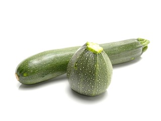 green zucchini vegetables isolated on white background