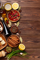 Various spices on wooden background