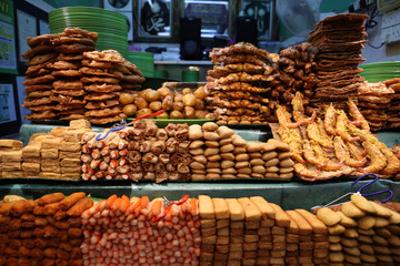 Street food - snacks on night market on Penang island, Malaysia