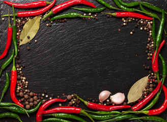 Chili pepper, peppercorn, garlic and bay leaves