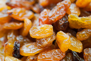 Yellow sultanas raisins background