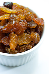 Heap of Raisins on vintage wooden background