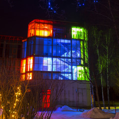 Modern illuminated different colours building night view