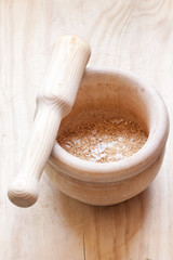 Close-up view of organic Gomasio in a ceramic bowl