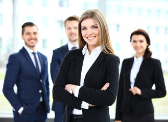 Face of beautiful woman on the background of business people