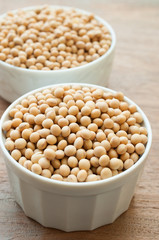 Soy beans on wooden board