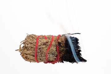 Burning Smudge Stick used for purification.