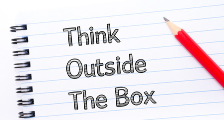 Think Outside the Box Text written on notebook page