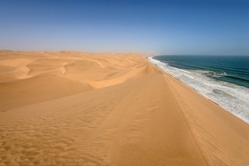 Fototapeta na wymiar Coastline in the Namib desert near Sandwich Harbour, Namibia