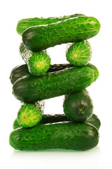 Cucumbers stack tower isolated on white