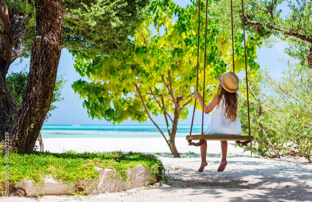 Canvas Prints Little girl on a swing