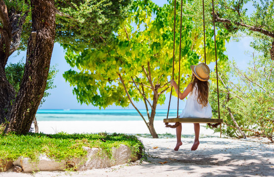 Little Girl On A Swing