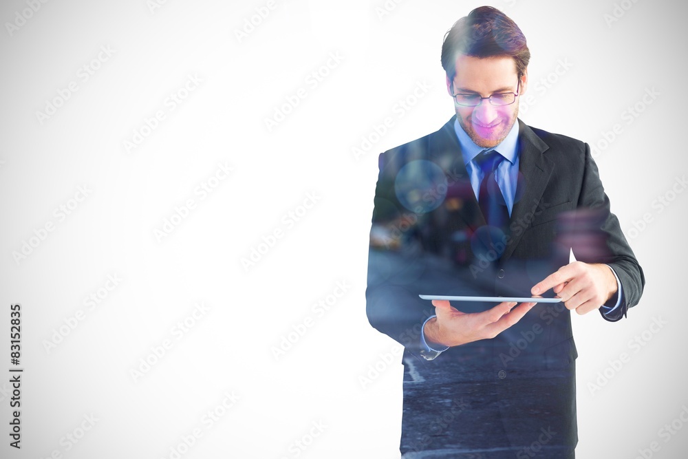 Aufkleber Composite image of businessman standing while using a tablet pc