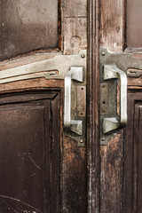 Vintage wooden doors with brass door knobs