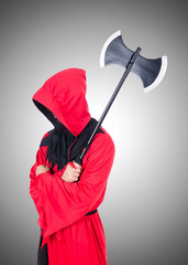 Executioner in red costume with axe on white