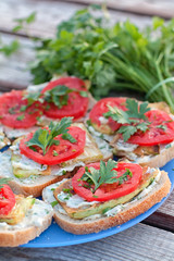 Sandwiches with grilled zucchini and fresh tomatoes