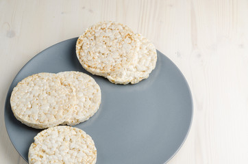 rice cake, puffed rice on table 

