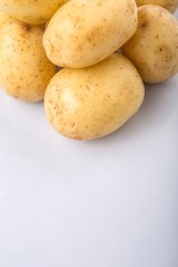 Baby potatoes over white background