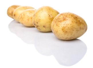 Baby potatoes over white background