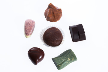 Handmade chocolate candies collection isolated on white backgrou
