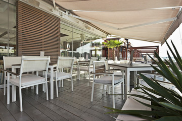 Modern riverside cafe terrace