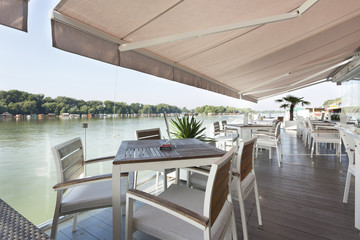 Modern riverside cafe terrace