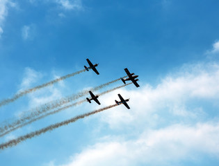 Silhouette sport aircraft in air show