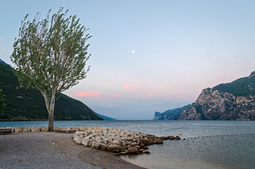 Lake Garda (Italy) and moon, early morning