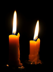 Two candles burning brightly.