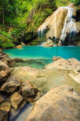 wonderful waterfall with colorful tree in thailand