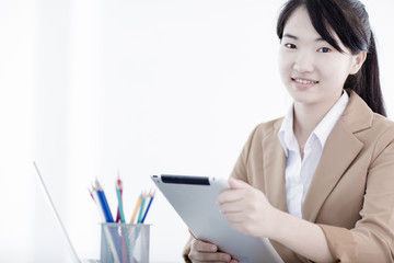 young asian businesswoman working in office