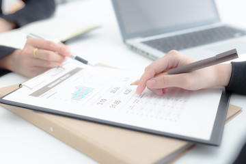 Business people discussing the charts and graphs showing the res