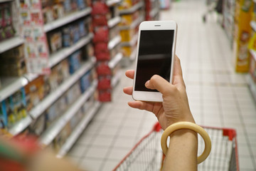 using mobile phone in market